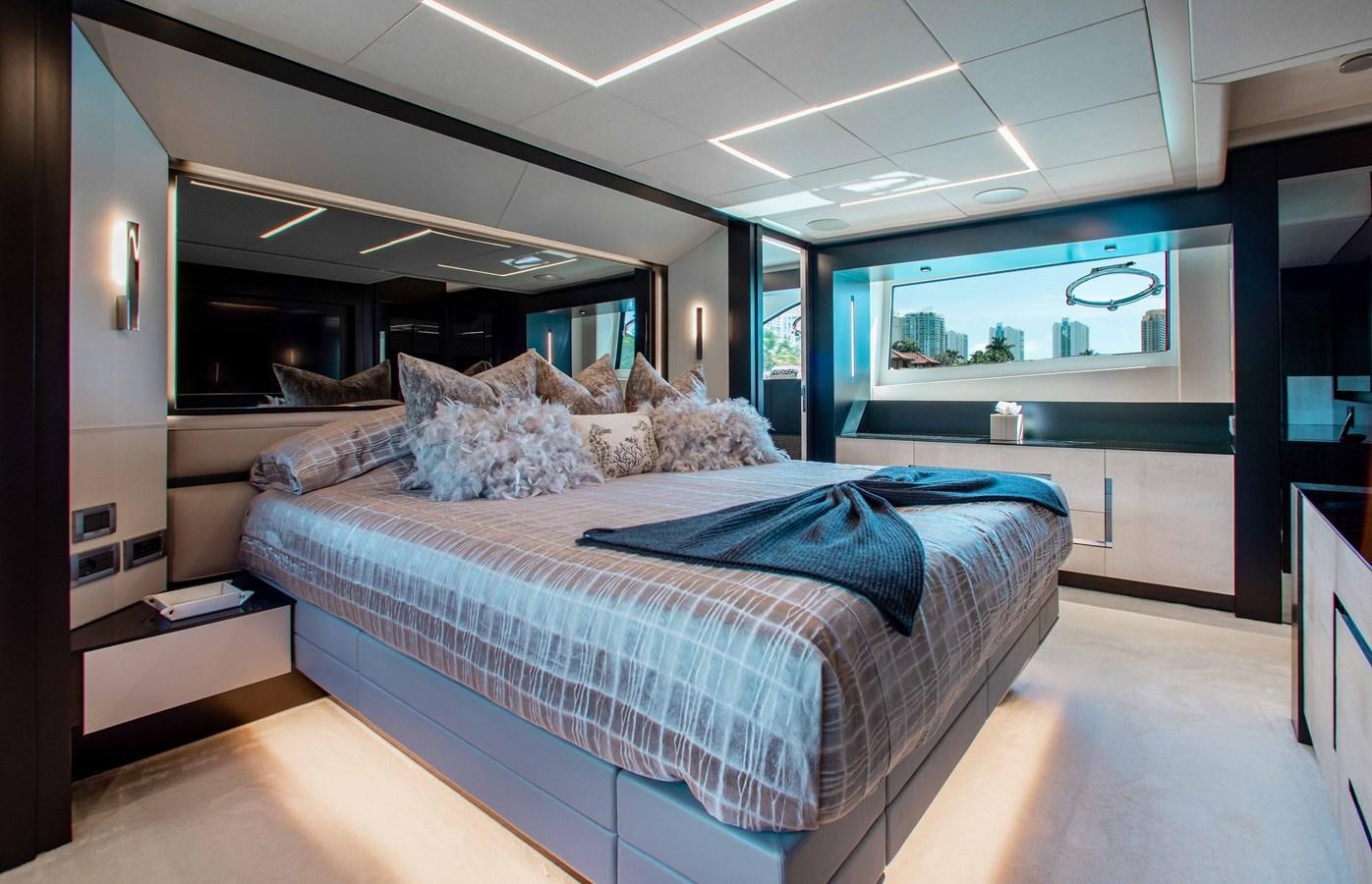 a bed in a room aboard LADY K Yacht for Sale