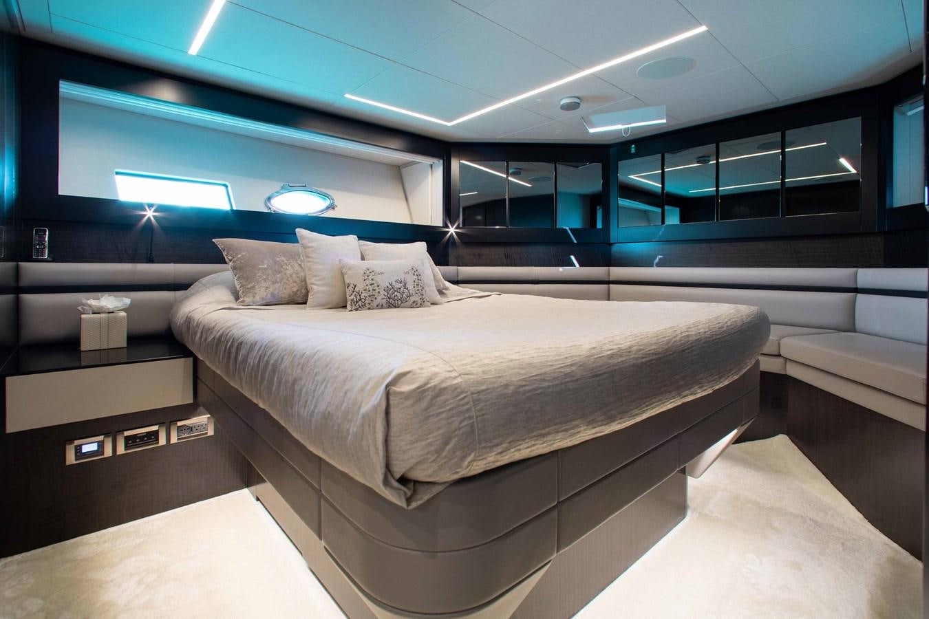 a bed in a room aboard LADY K Yacht for Sale