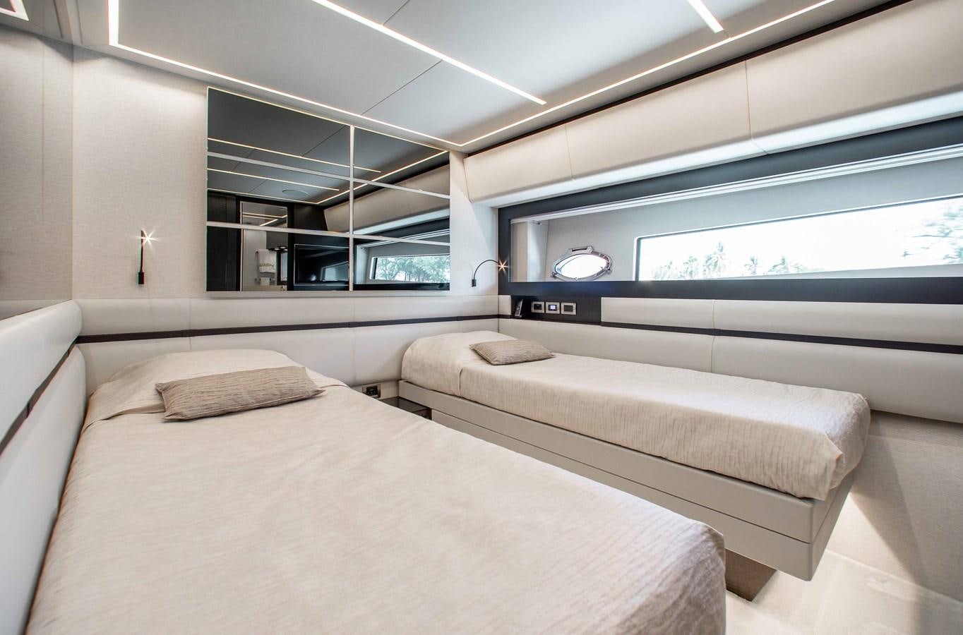 a room with two beds aboard LADY K Yacht for Sale