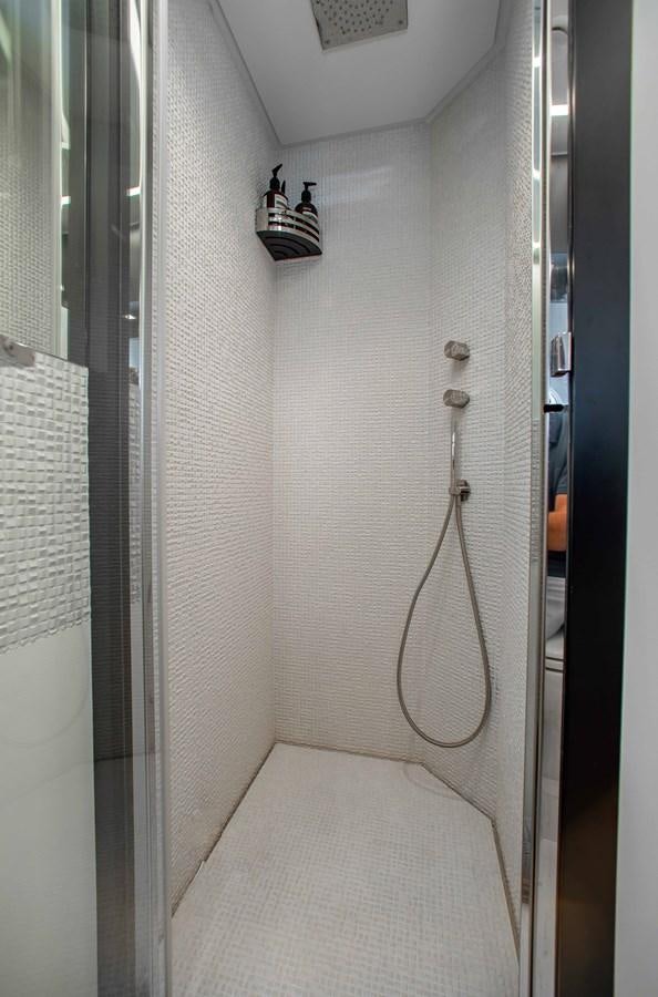 a person on a swinger in a hallway aboard LADY K Yacht for Sale