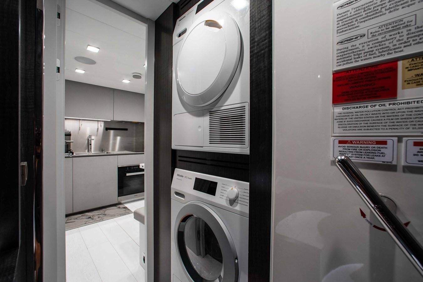 a machine in a room aboard LADY K Yacht for Sale