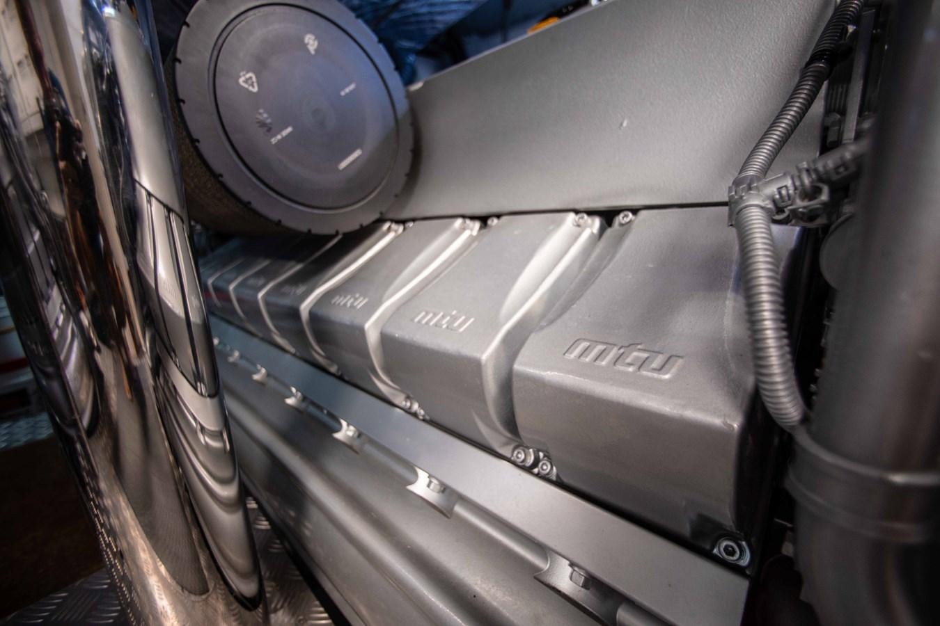 a close-up of a car engine aboard LADY K Yacht for Sale