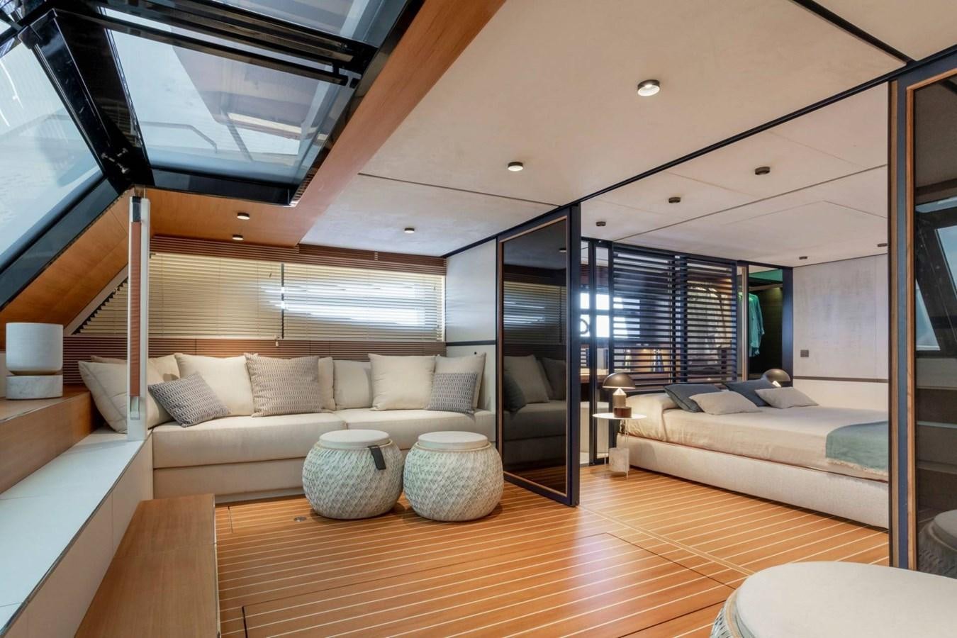 a modern looking living room aboard EVO V8  Yacht for Sale