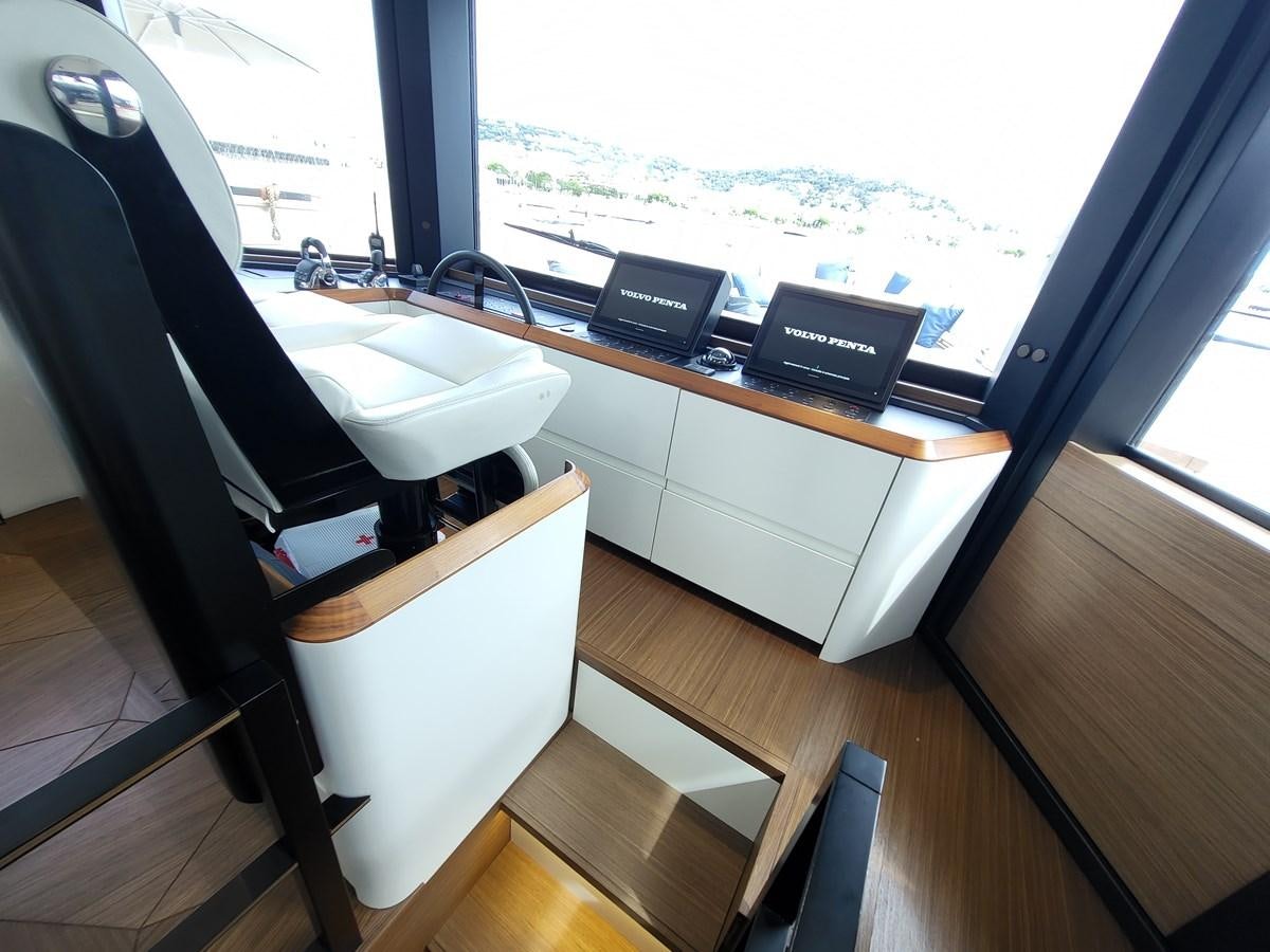 a chair next to a sink aboard EVO V8  Yacht for Sale