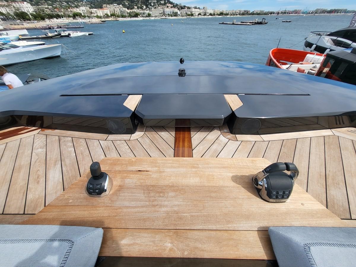 a boat on a deck aboard EVO V8  Yacht for Sale