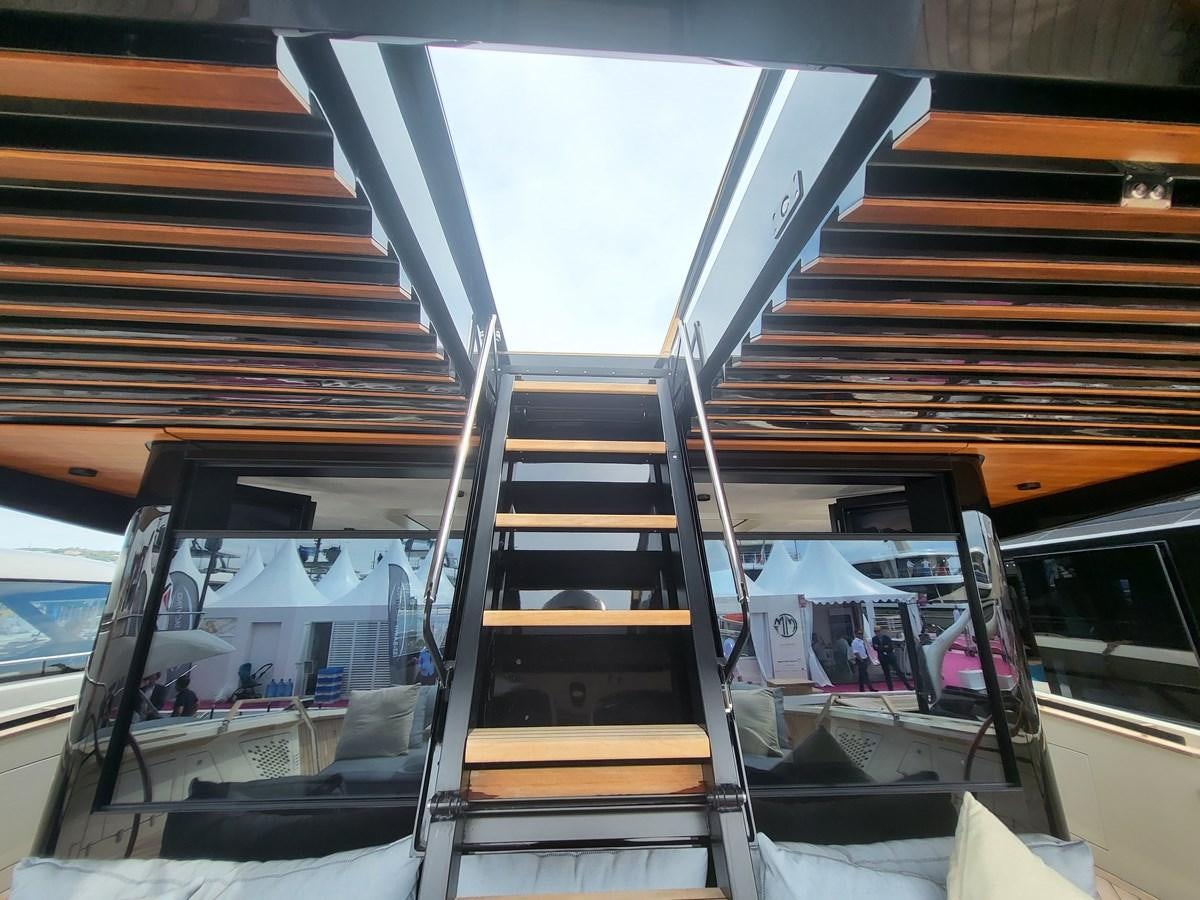a wooden staircase in a building aboard EVO V8  Yacht for Sale