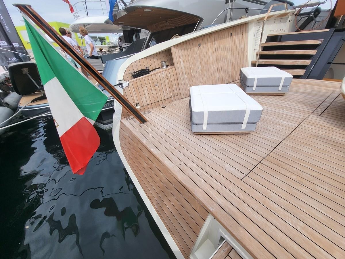 a group of people playing pool aboard EVO V8  Yacht for Sale