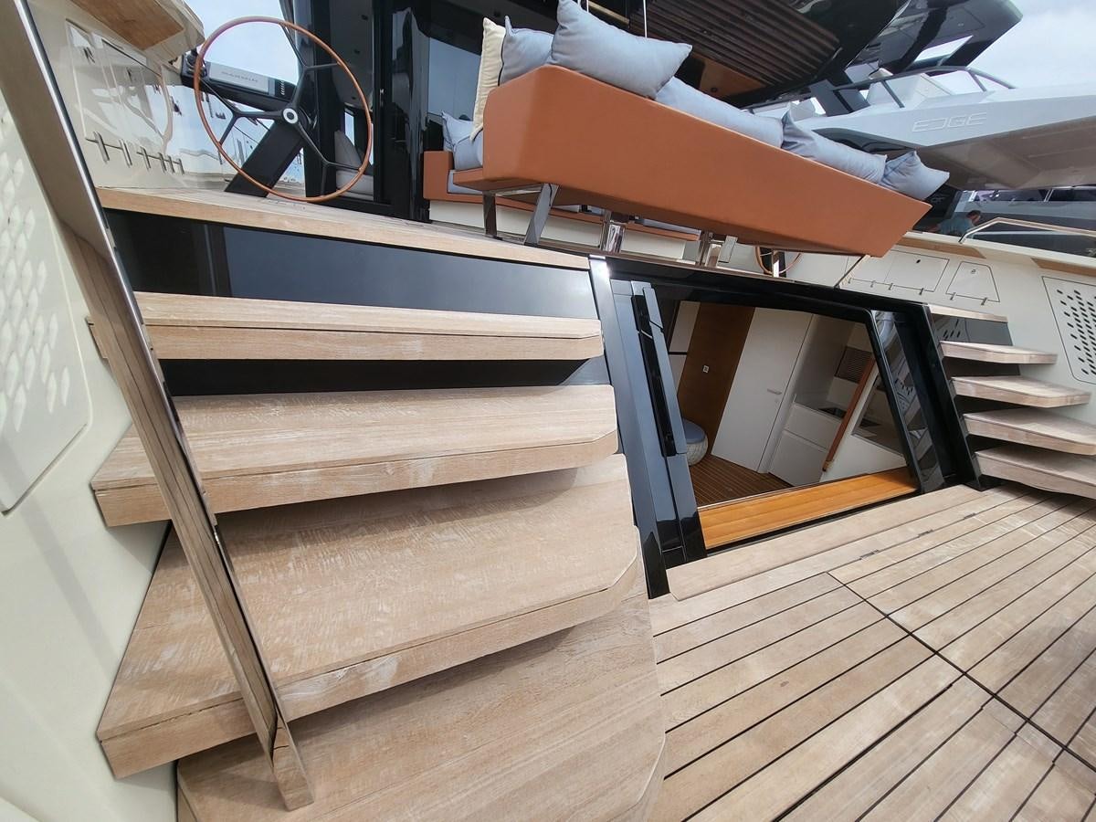 a wooden bench in a room aboard EVO V8  Yacht for Sale