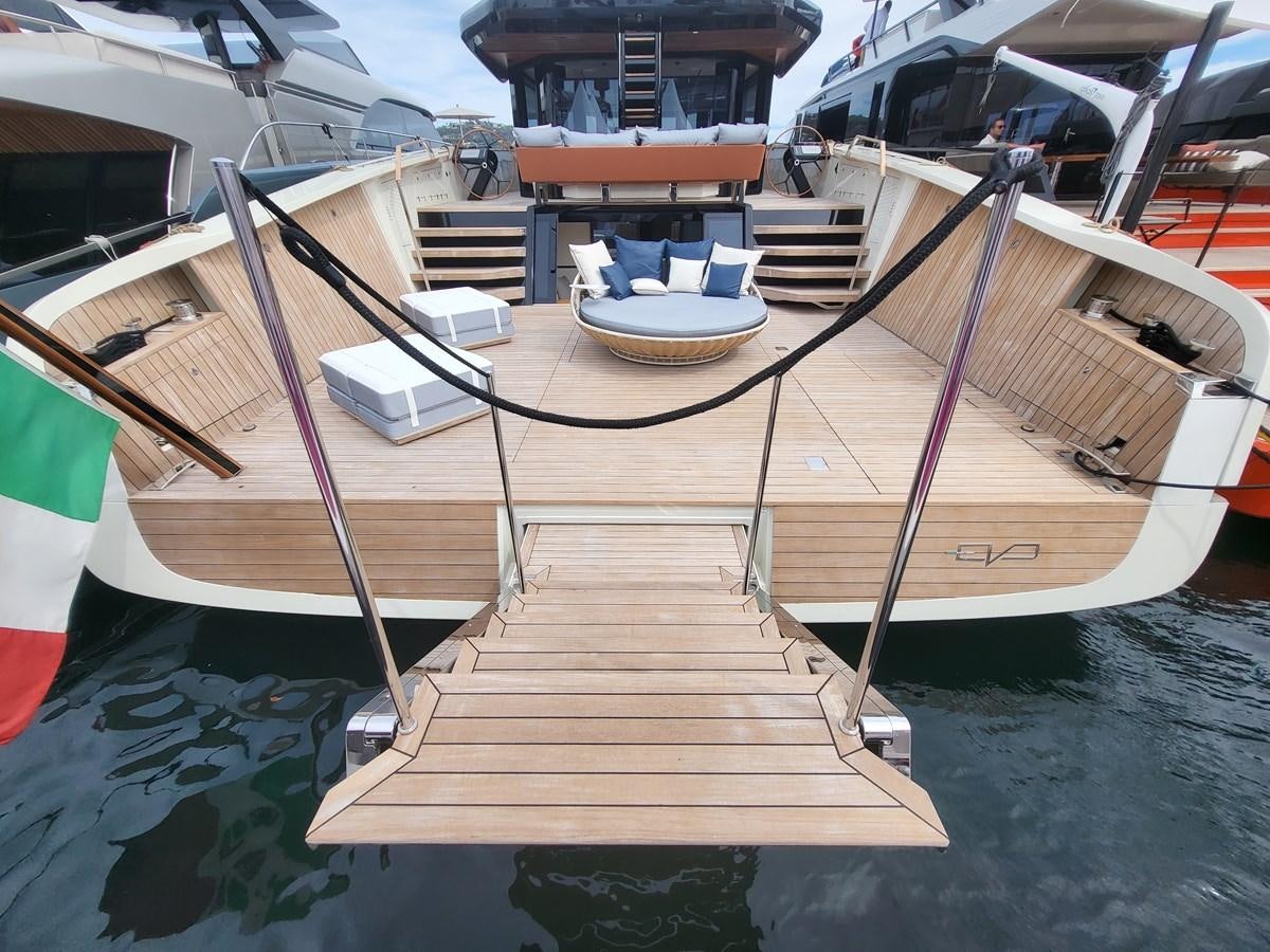 a boat with a dock aboard EVO V8  Yacht for Sale
