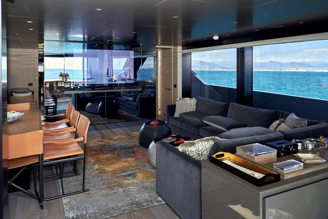 a living room with a large window aboard SL96A Yacht for Sale