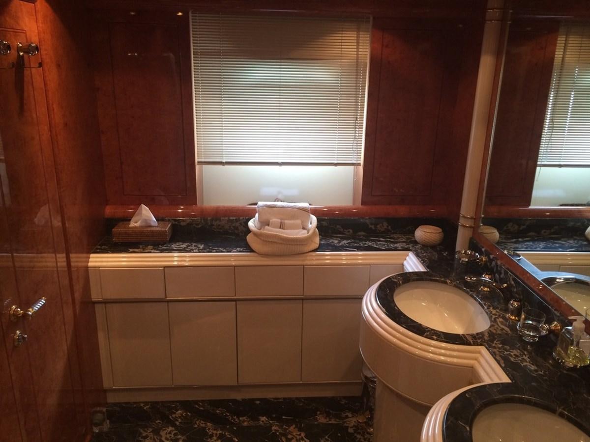a bathroom with a toilet and a sink aboard BIRD OF PREY  Yacht for Sale