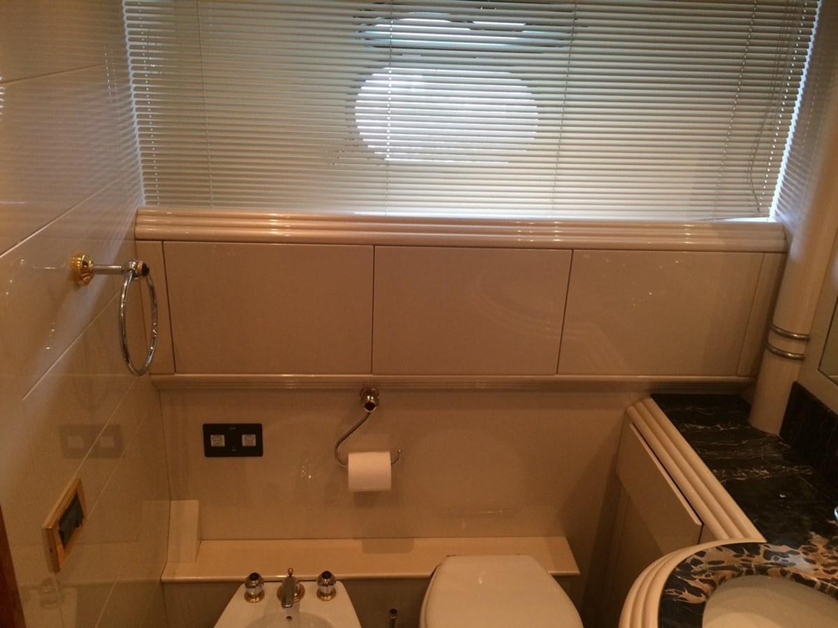a bathroom with a shower curtain aboard BIRD OF PREY  Yacht for Sale
