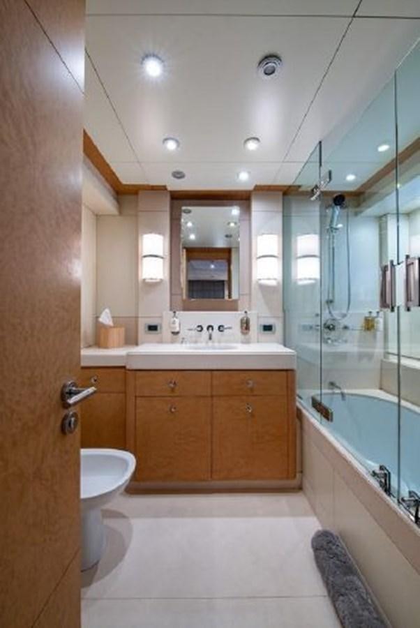 a bathroom with a glass shower aboard 174 OCEANFAST MOTOR YACHT Yacht for Sale