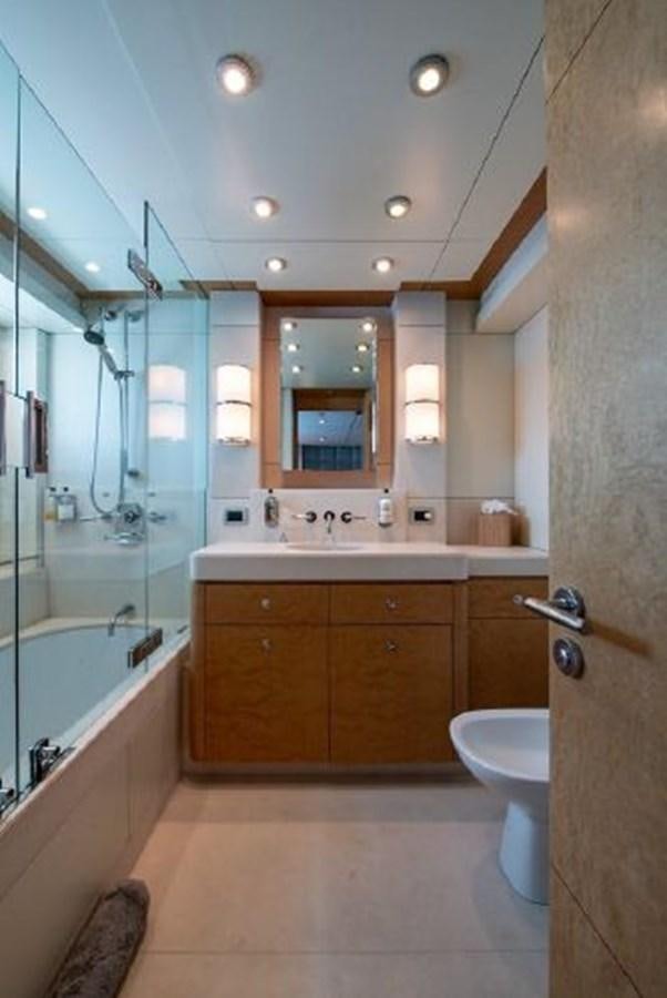 a bathroom with a large mirror aboard 174 OCEANFAST MOTOR YACHT Yacht for Sale