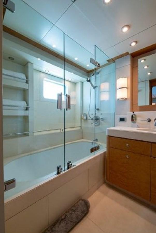 a bathroom with a large tub aboard 174 OCEANFAST MOTOR YACHT Yacht for Sale