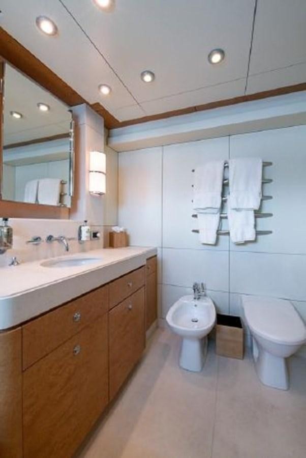 a bathroom with a toilet and a sink aboard 174 OCEANFAST MOTOR YACHT Yacht for Sale