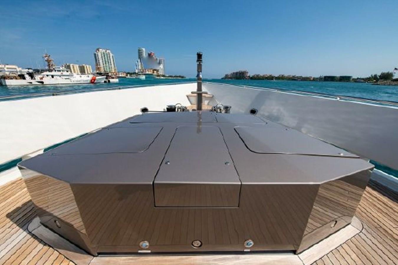 a deck with a view of a city and water aboard 174 OCEANFAST MOTOR YACHT Yacht for Sale