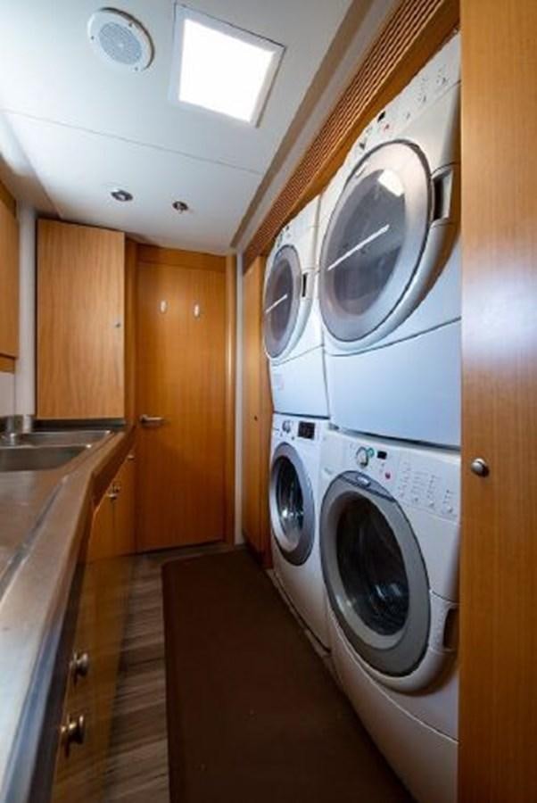 a washing machine in a room aboard 174 OCEANFAST MOTOR YACHT Yacht for Sale