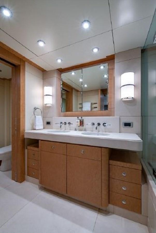 a bathroom with a large mirror aboard 174 OCEANFAST MOTOR YACHT Yacht for Sale
