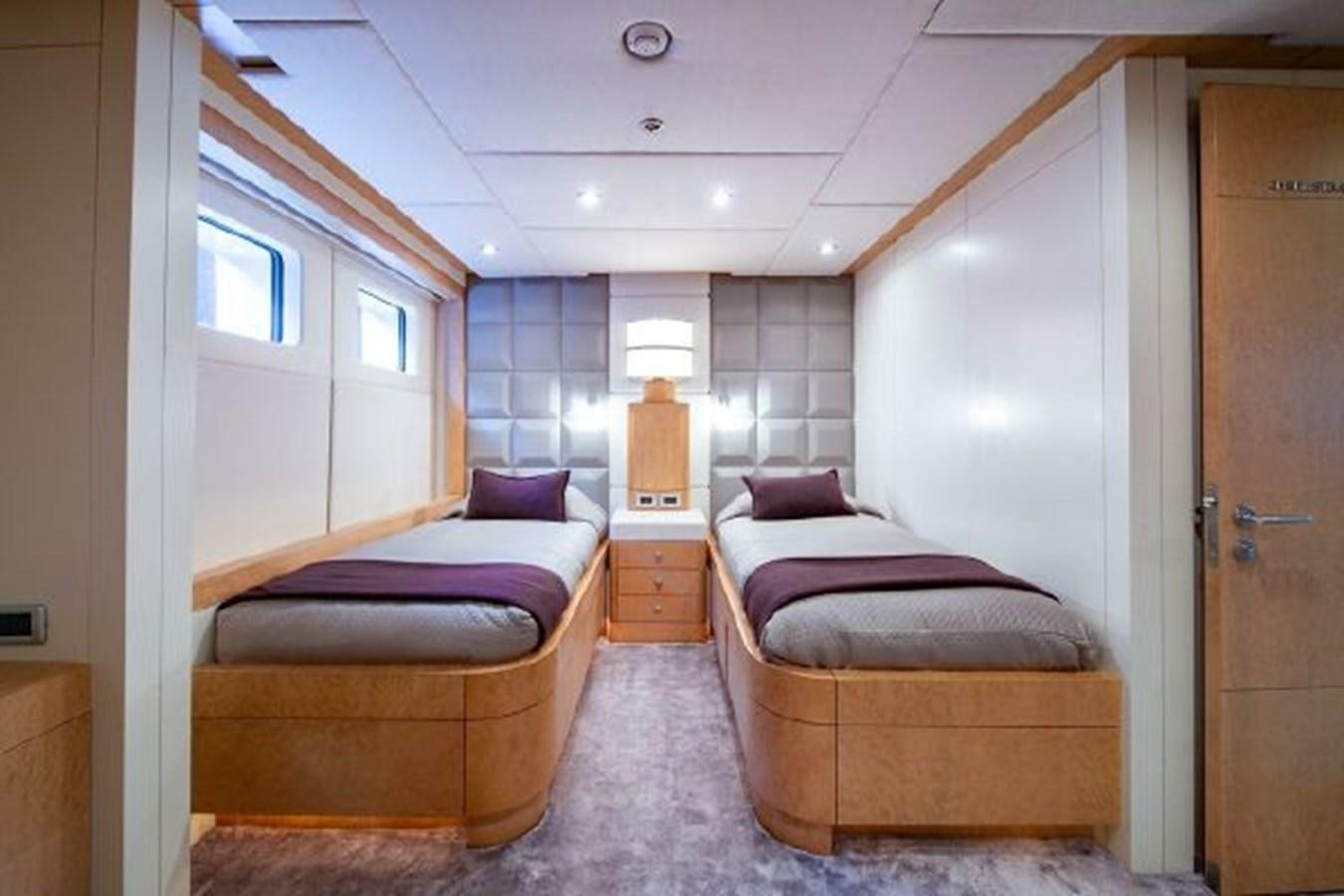 a bedroom with two beds aboard 174 OCEANFAST MOTOR YACHT Yacht for Sale