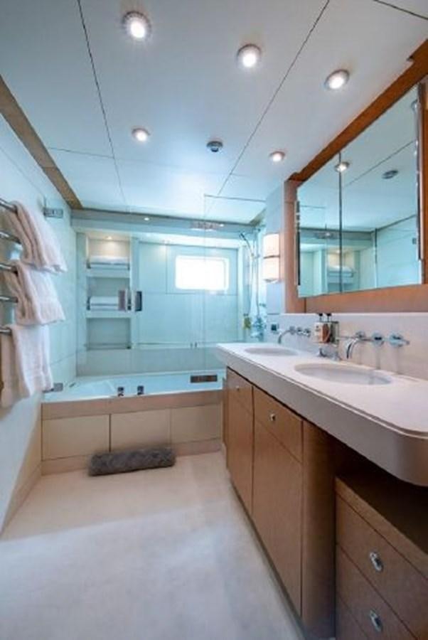a bathroom with a large mirror aboard 174 OCEANFAST MOTOR YACHT Yacht for Sale
