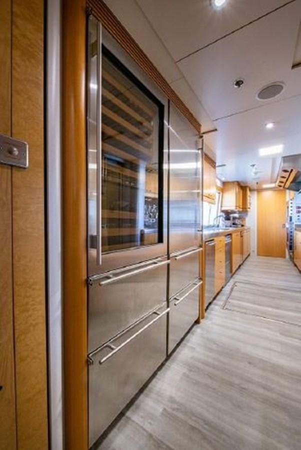 a hallway with glass doors aboard 174 OCEANFAST MOTOR YACHT Yacht for Sale