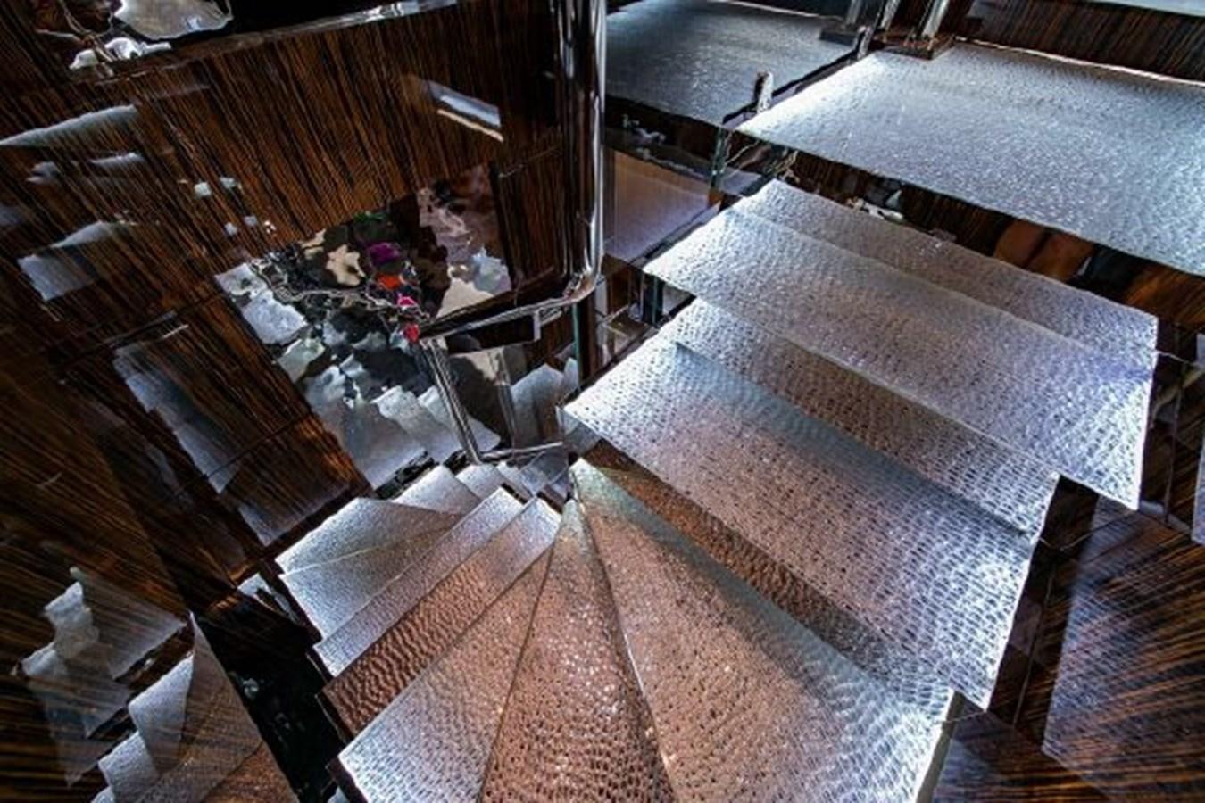 a room with a large wood table and chairs aboard 174 OCEANFAST MOTOR YACHT Yacht for Sale