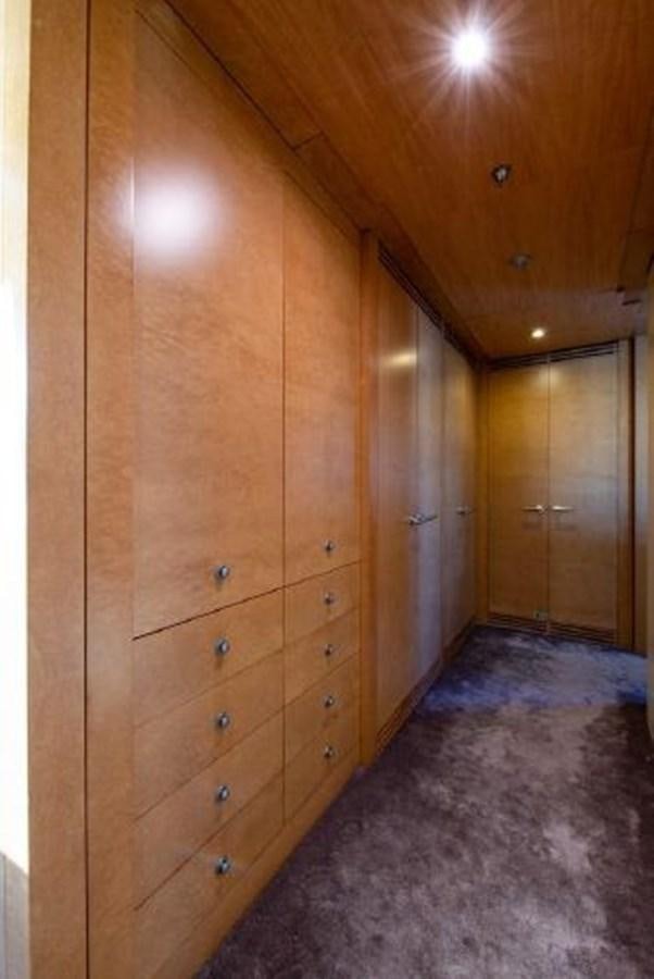 a room with wooden cabinets aboard 174 OCEANFAST MOTOR YACHT Yacht for Sale
