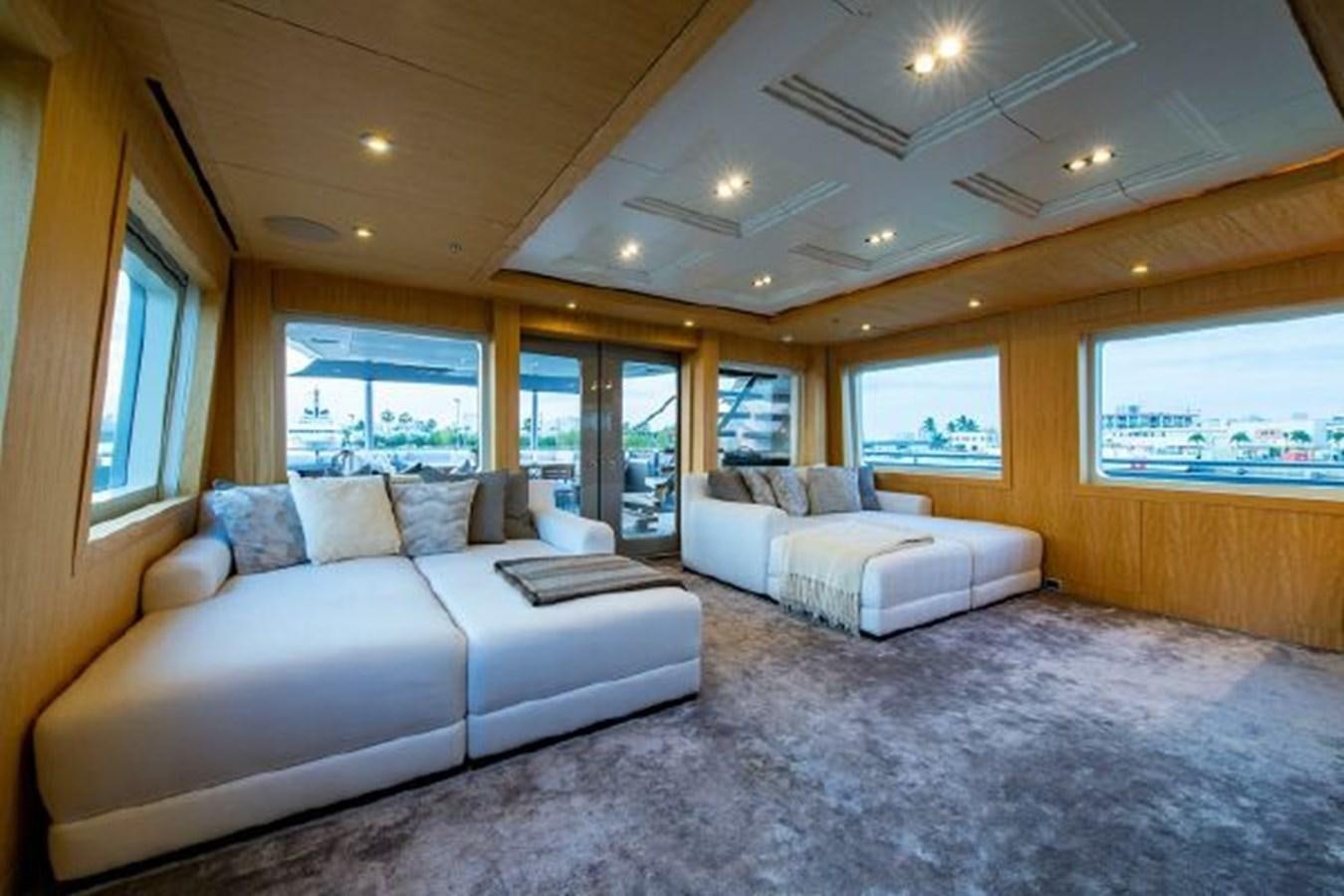 a living room with a large window aboard 174 OCEANFAST MOTOR YACHT Yacht for Sale