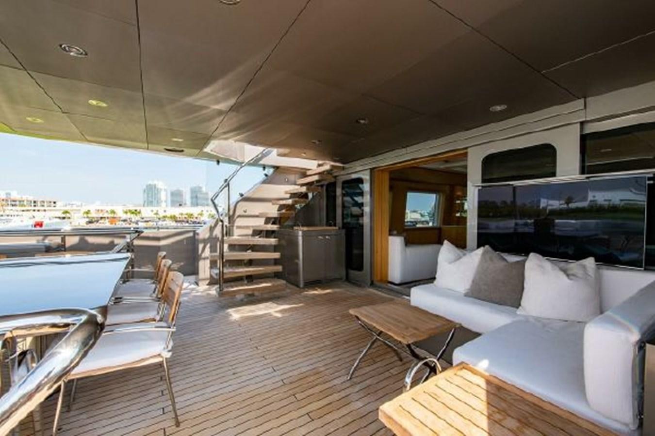 a living room with a large balcony aboard 174 OCEANFAST MOTOR YACHT Yacht for Sale