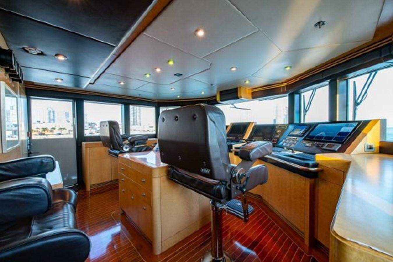 a room with a desk and chairs aboard 174 OCEANFAST MOTOR YACHT Yacht for Sale