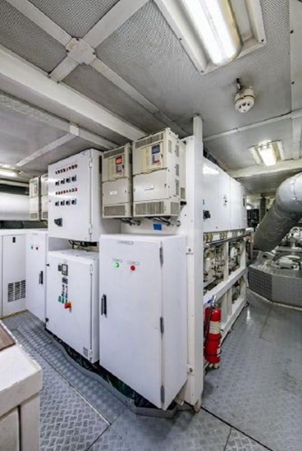 a large room with white cabinets aboard 174 OCEANFAST MOTOR YACHT Yacht for Sale