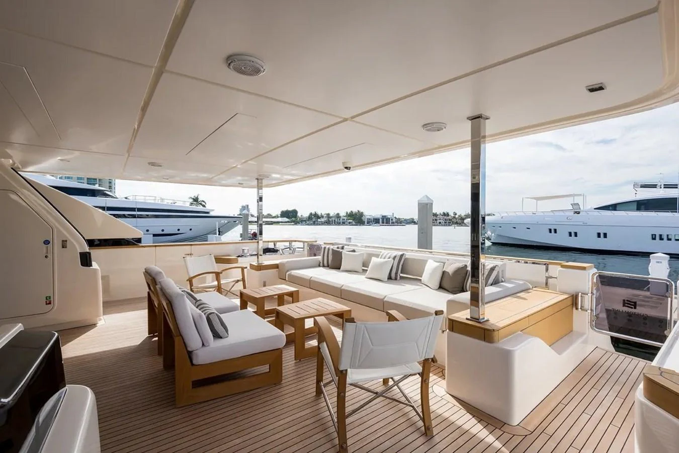 a room with a large boat in the background aboard GIOIA Yacht for Sale