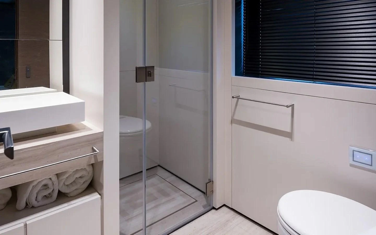 a bathroom with a toilet and a sink aboard GIOIA Yacht for Sale
