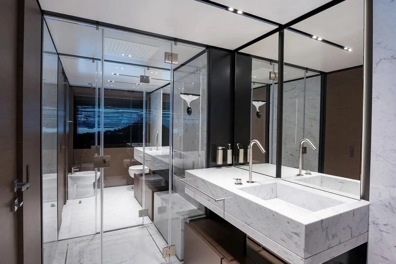 a bathroom with sinks and mirrors aboard GIOIA Yacht for Sale
