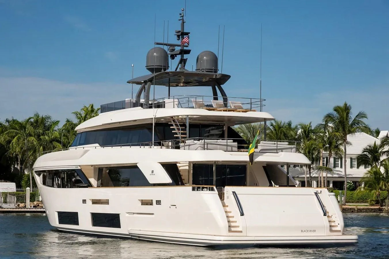 a white boat with a blue sky aboard GIOIA Yacht for Sale