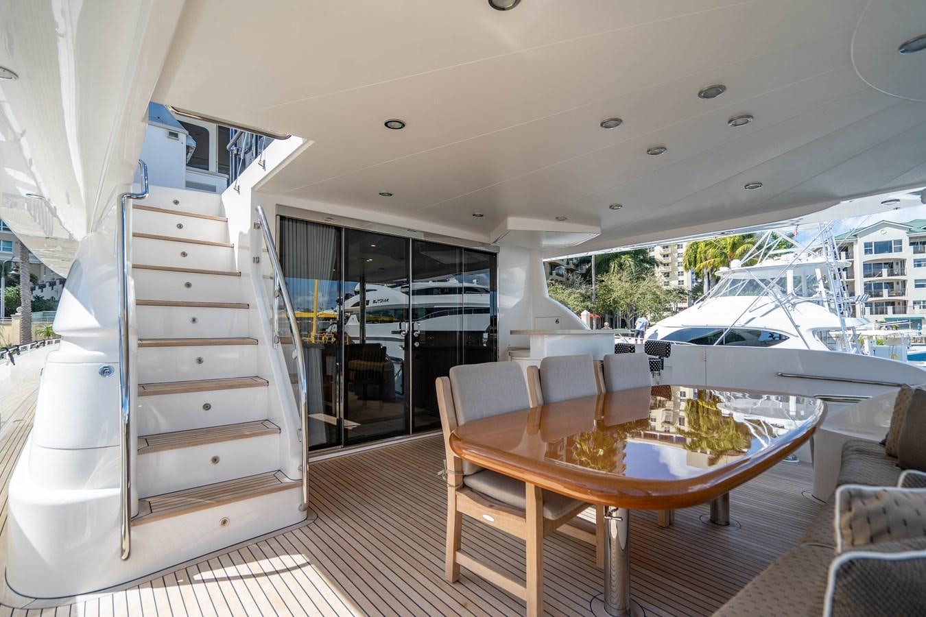 a room with a table and chairs aboard SPREZZATURA Yacht for Sale