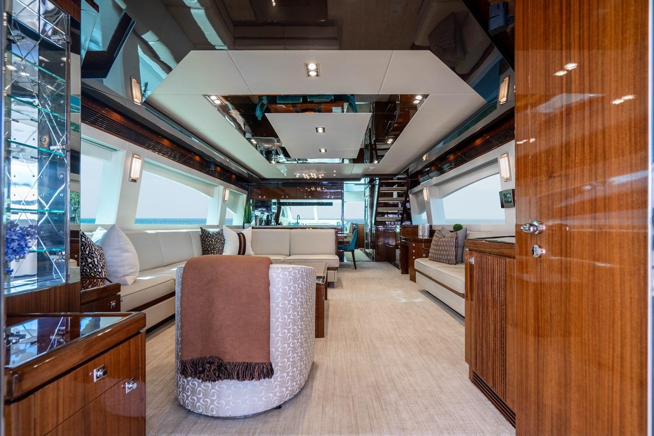 a room with a couch and a chair aboard SPREZZATURA Yacht for Sale