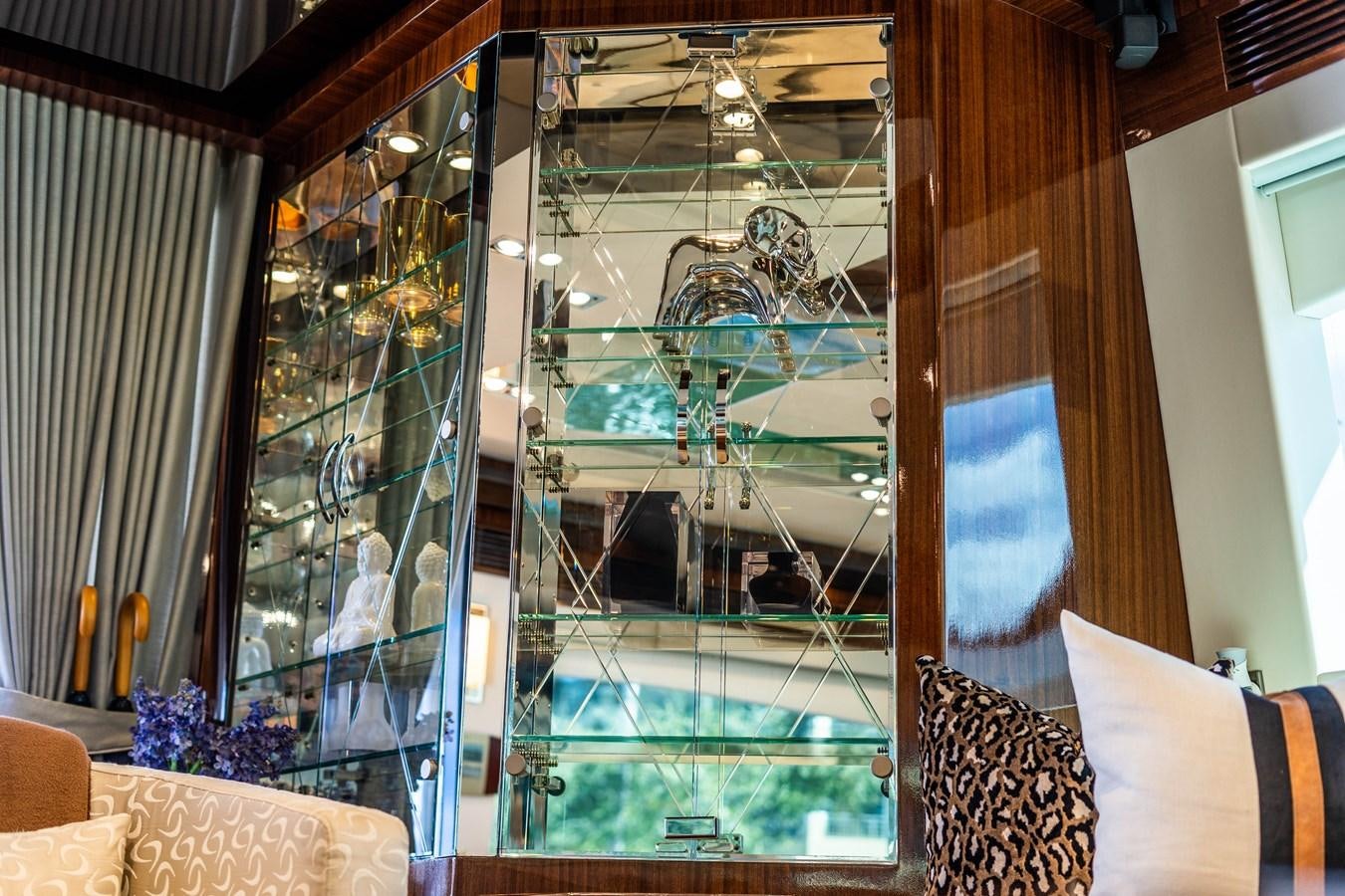 a glass window with a view of a city aboard SPREZZATURA Yacht for Sale