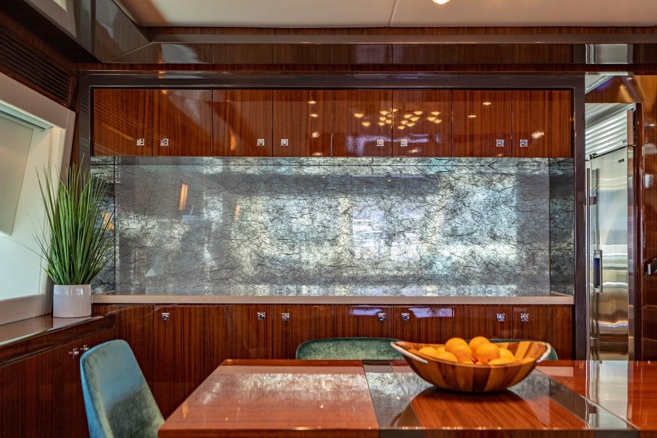 a bowl of fruit on a table aboard SPREZZATURA Yacht for Sale