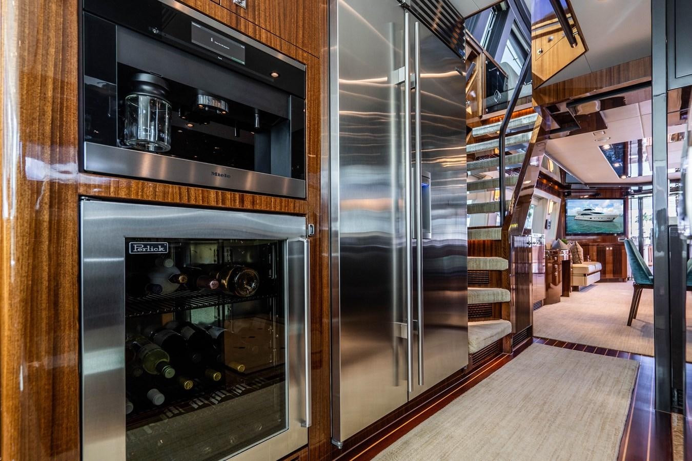a large kitchen with steel appliances aboard SPREZZATURA Yacht for Sale