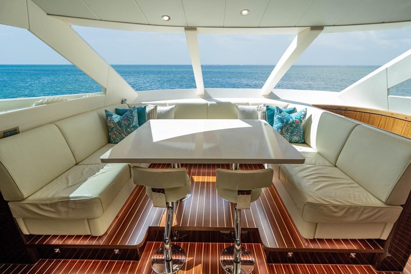 a table and chairs on a boat aboard SPREZZATURA Yacht for Sale