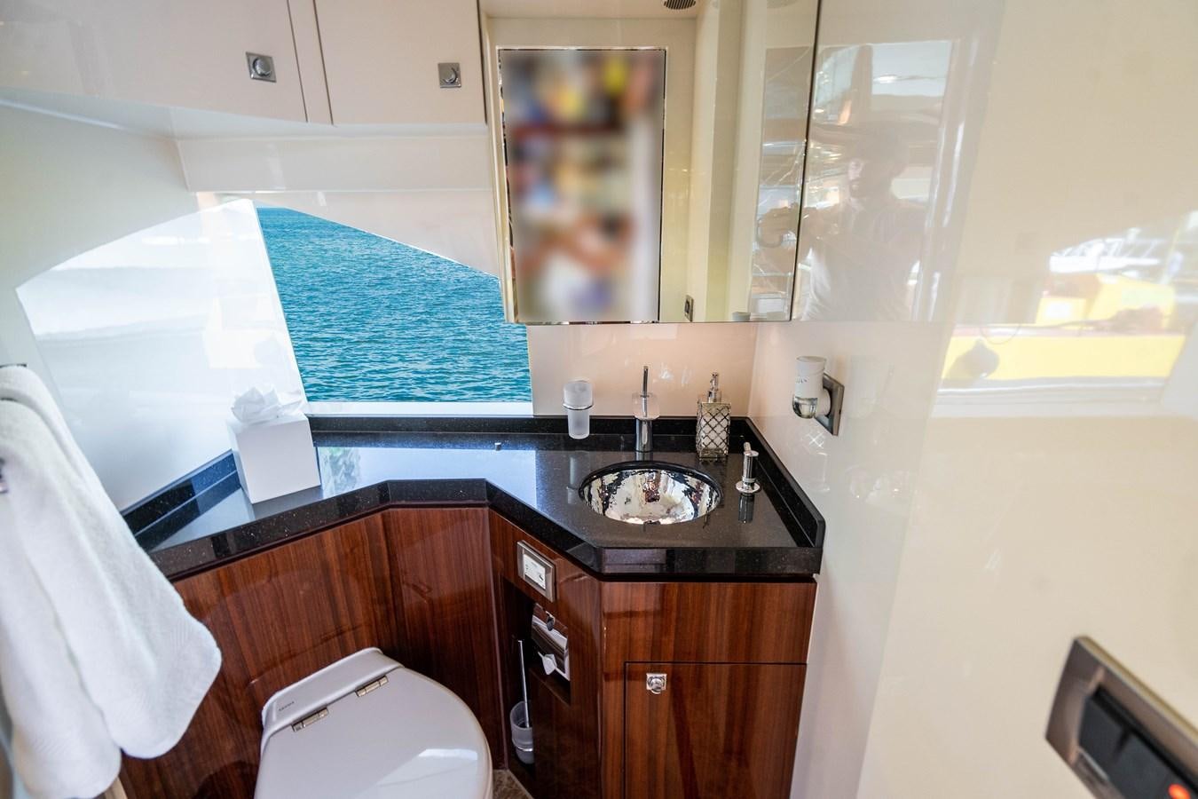 a bathroom with a sink and a bathtub aboard SPREZZATURA Yacht for Sale