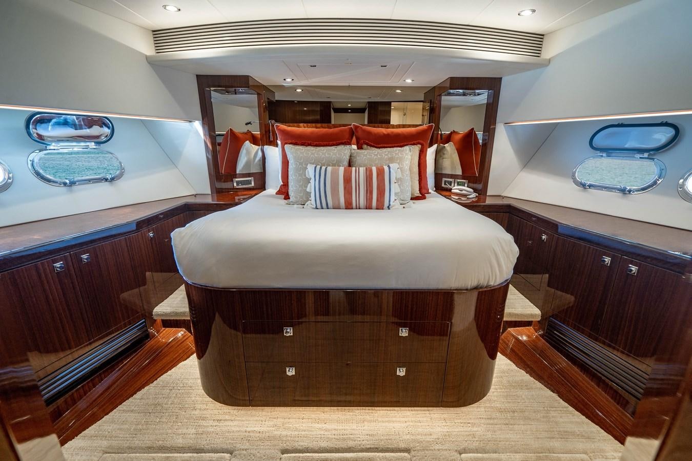 a bed in a room aboard SPREZZATURA Yacht for Sale