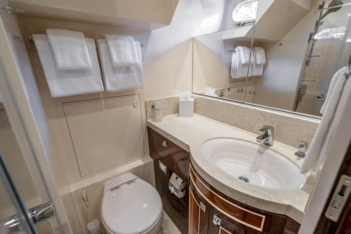 a bathroom with a sink and a toilet aboard SPREZZATURA Yacht for Sale