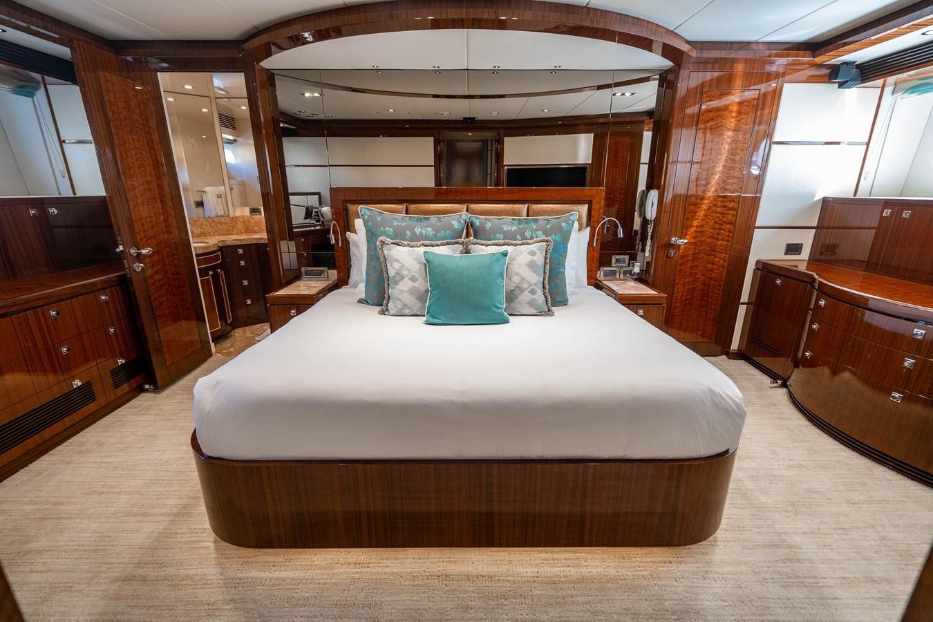 a bed in a room aboard SPREZZATURA Yacht for Sale