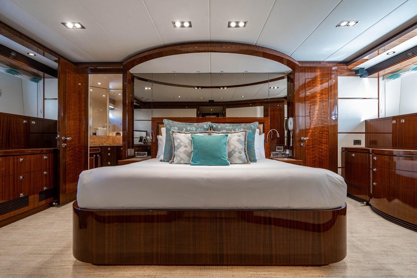 a bed in a room aboard SPREZZATURA Yacht for Sale
