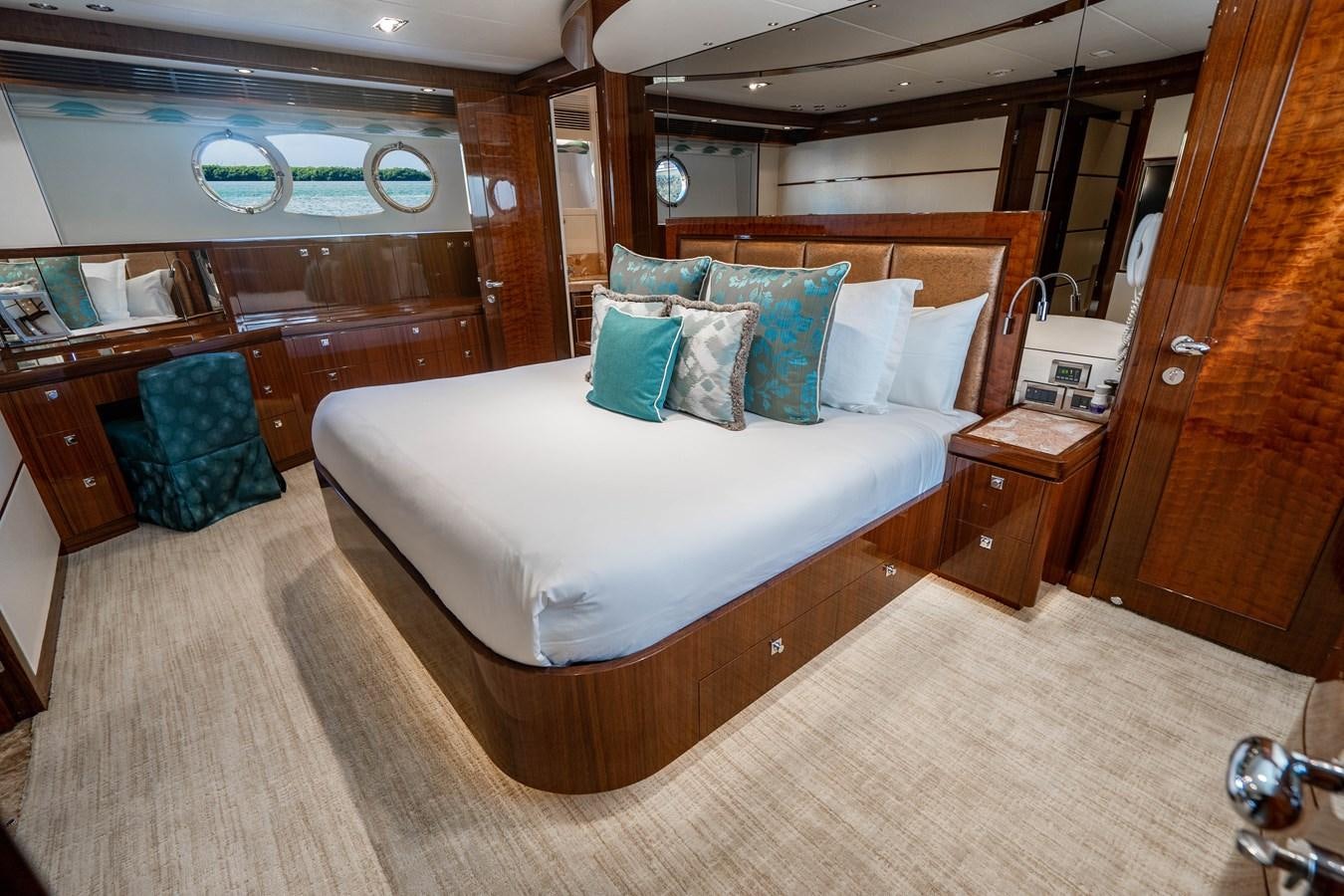 a bed in a room aboard SPREZZATURA Yacht for Sale