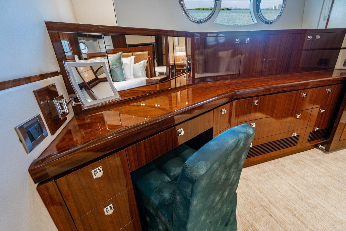 a room with a chair and a desk aboard SPREZZATURA Yacht for Sale