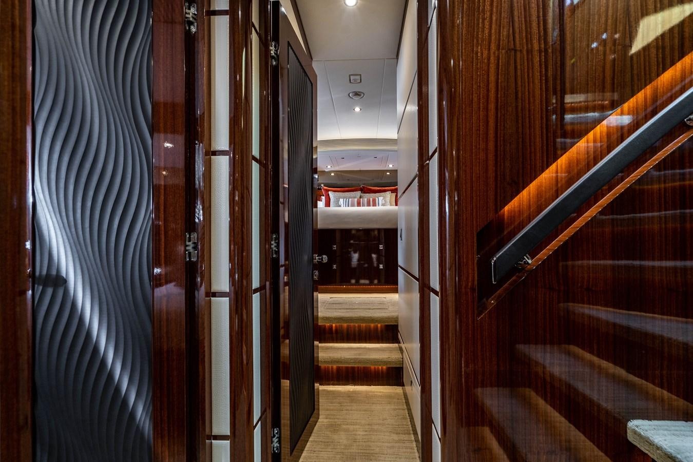 a hallway with a blue curtain aboard SPREZZATURA Yacht for Sale